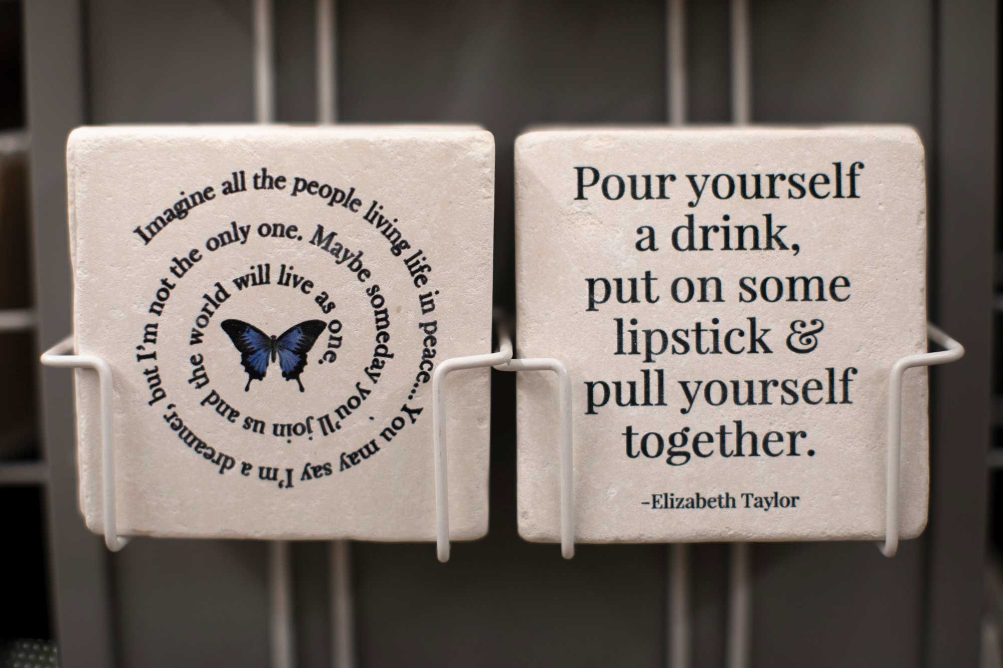 funny sayings coasters on a rack