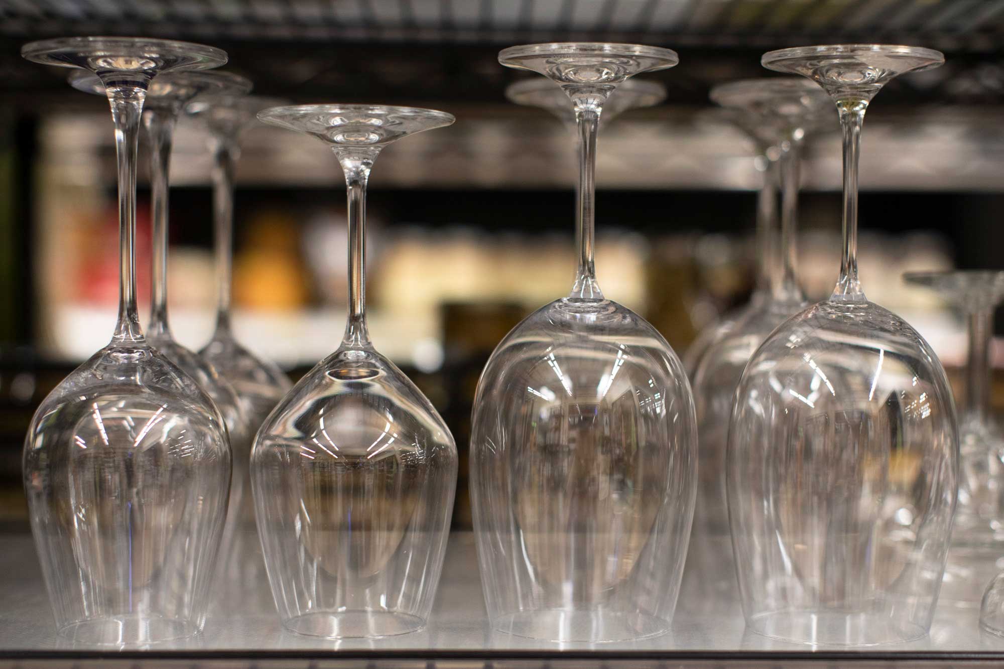 wine glasses on a shelf