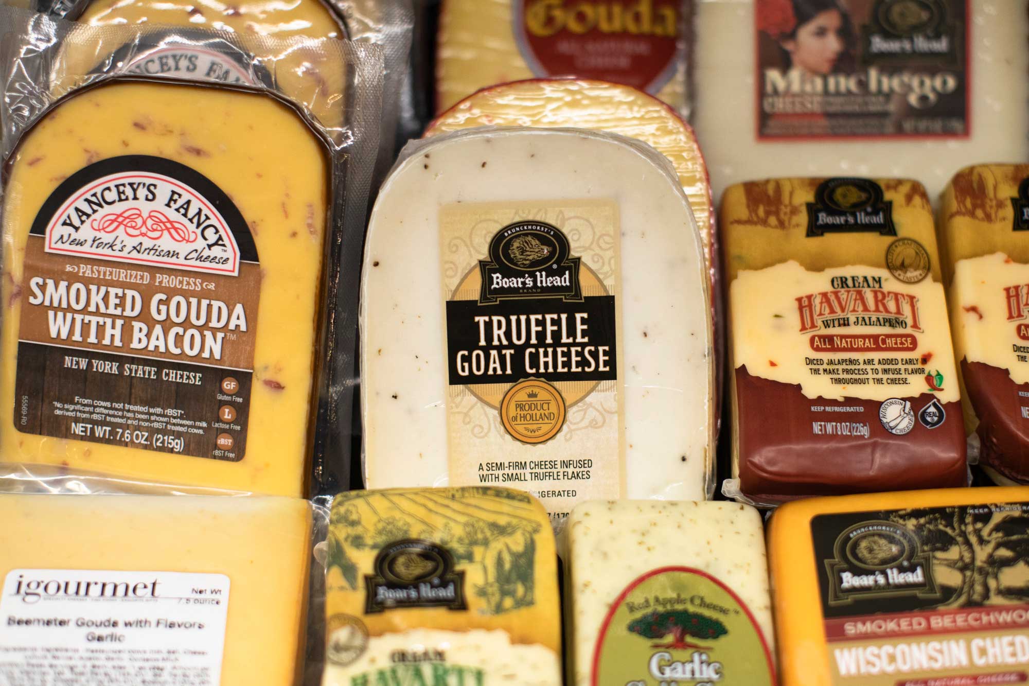 selection of cheeses in specialty foods section